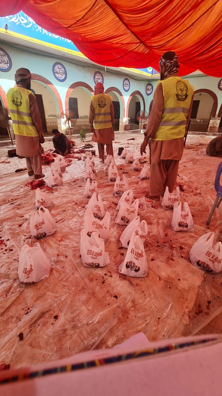 Eid ul adha qurbani meat bags and volunteers