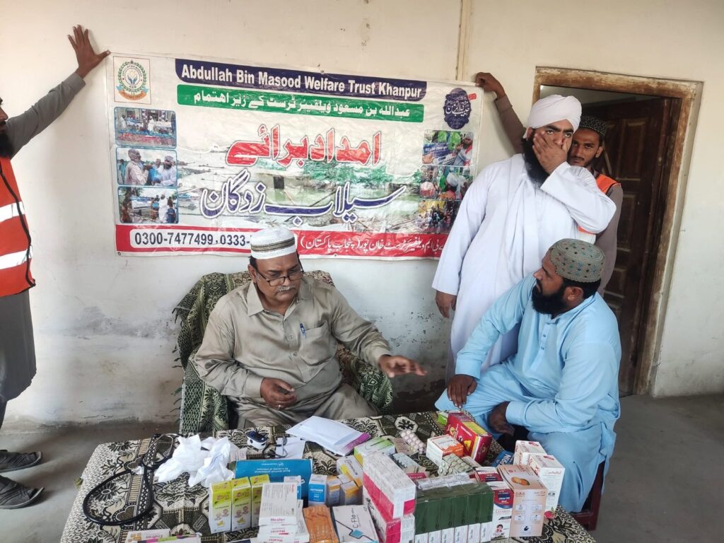 Doctor consulting a patient at a medical relief camp