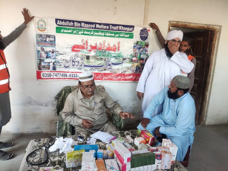 Doctor consulting a patient at a medical relief camp