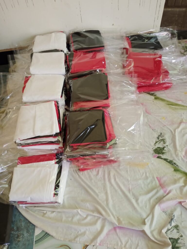 Folded clothing packages ready for distribution