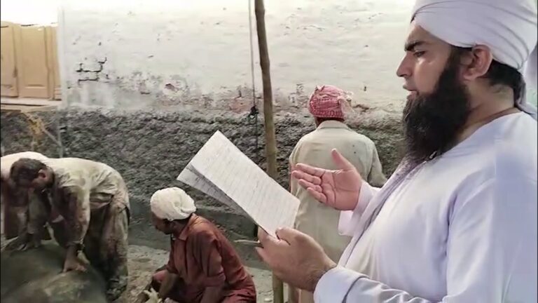 Scholar reading dua during eid ul adha qurbani