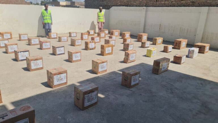 Volunteers preparing ramadan ration box distribution